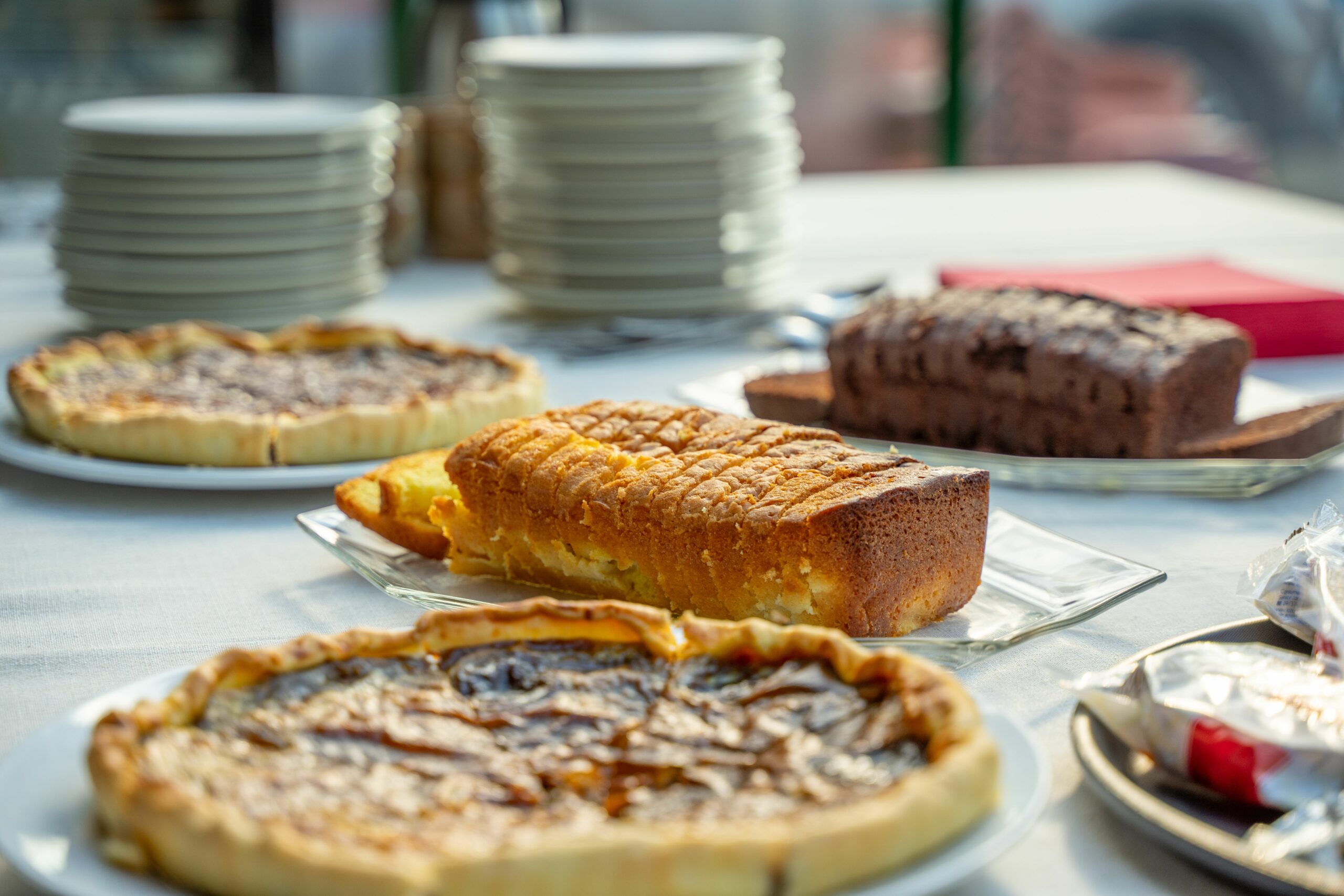 A variety of freshly baked goods displayed on a table, perfect for brunch or a casual meal.